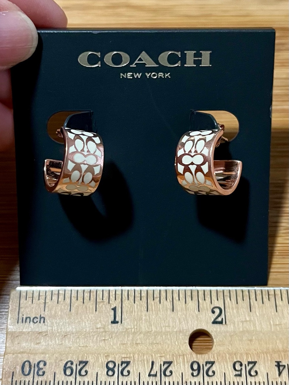 Coach Rose Gold Tone & White Enamel Signature Logo Huggie Hoop Earrings